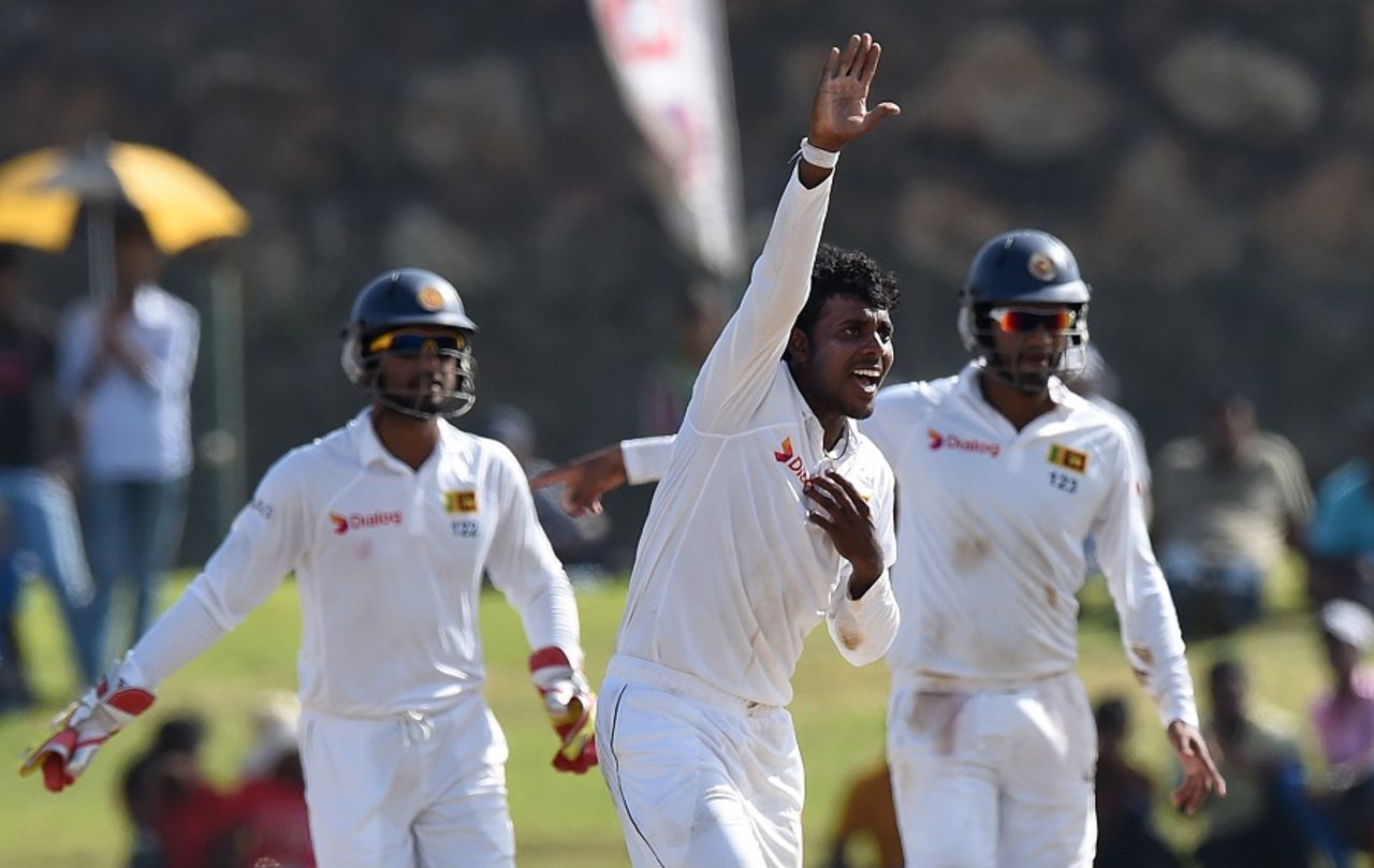Tharindu Kaushal celebrates after dismissing Harbhajan Singh, Sri Lanka v India, 1st Test, Galle, 2nd day, August 13, 2015