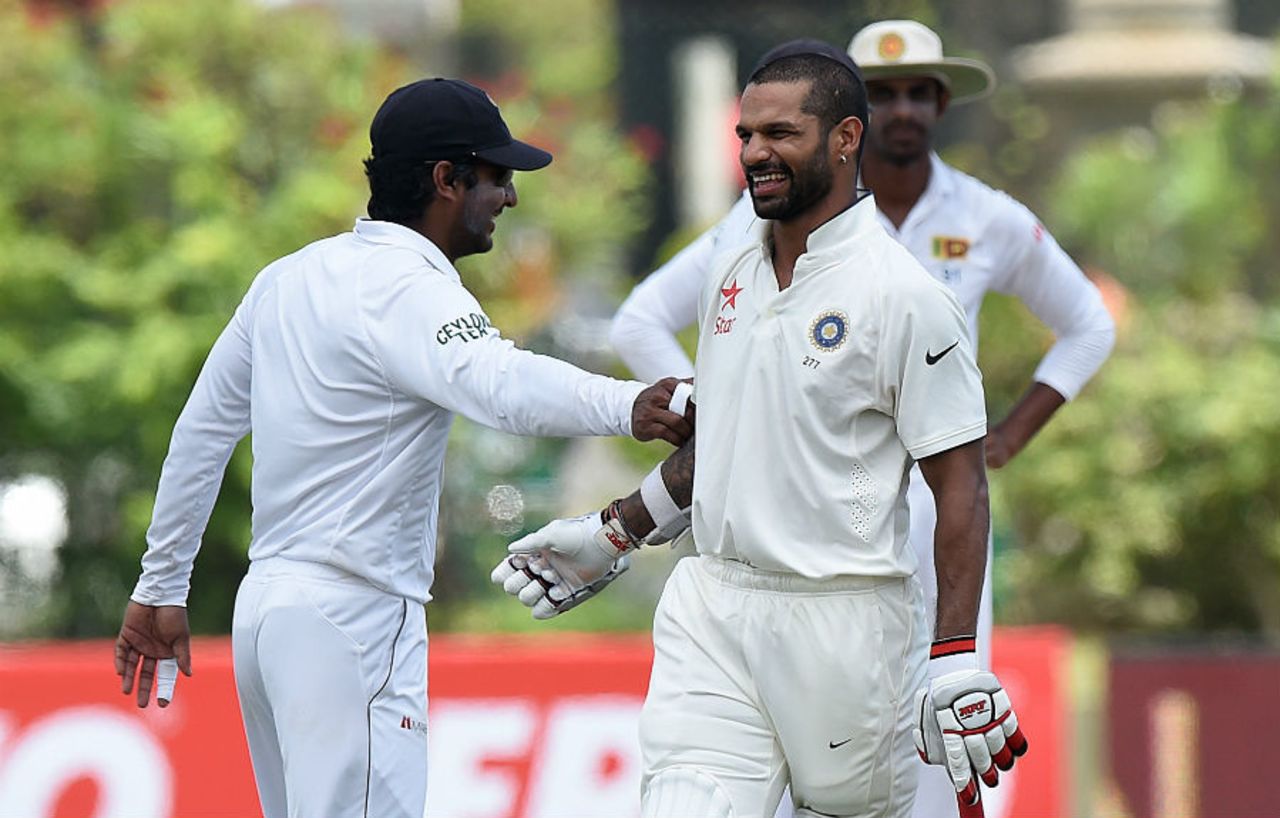 Shikhar Dhawan and Kumar Sangakkara share a lighter moment, Sri Lanka v India, 1st Test, Galle, 2nd day, August 13, 2015