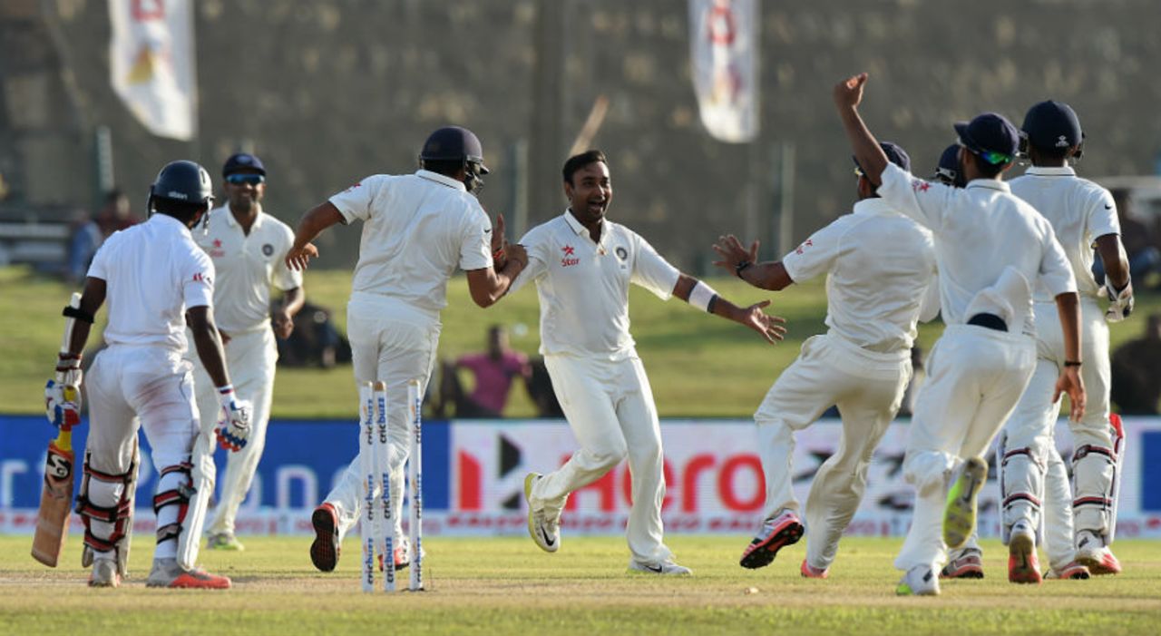 Amit Mishra is mobbed by his team-mates after dismissing Kaushal Silva, Sri Lanka v India, 1st Test, Galle, 2nd day, August 13, 2015