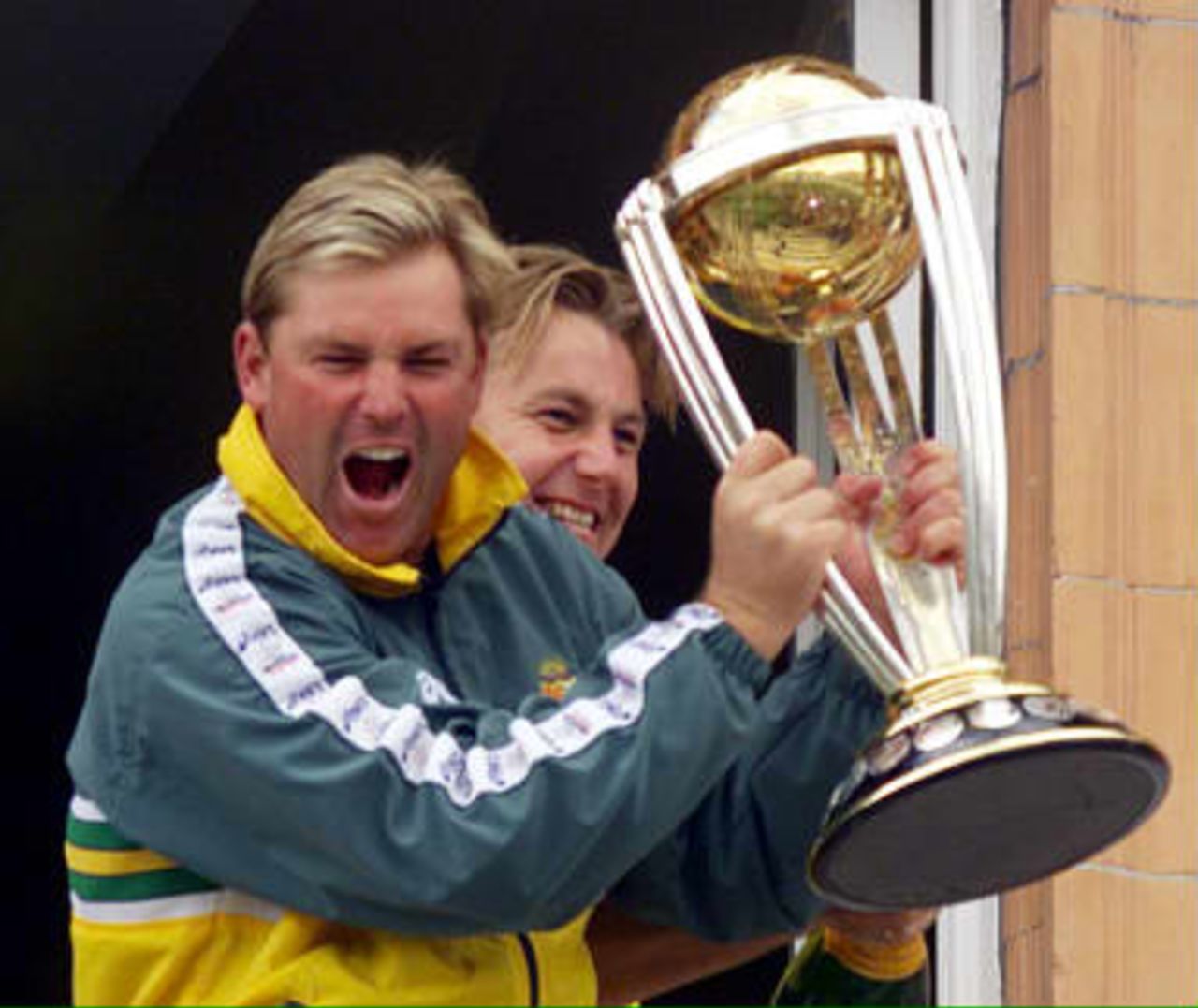 Australia's Shane Warne holds up the Cricket World Cup after Australia defeated Pakistan in the final by 8 wickets at Lords in London.  Warne took four wickets and was Man-of-the-Match. Sunday 20 June 1999