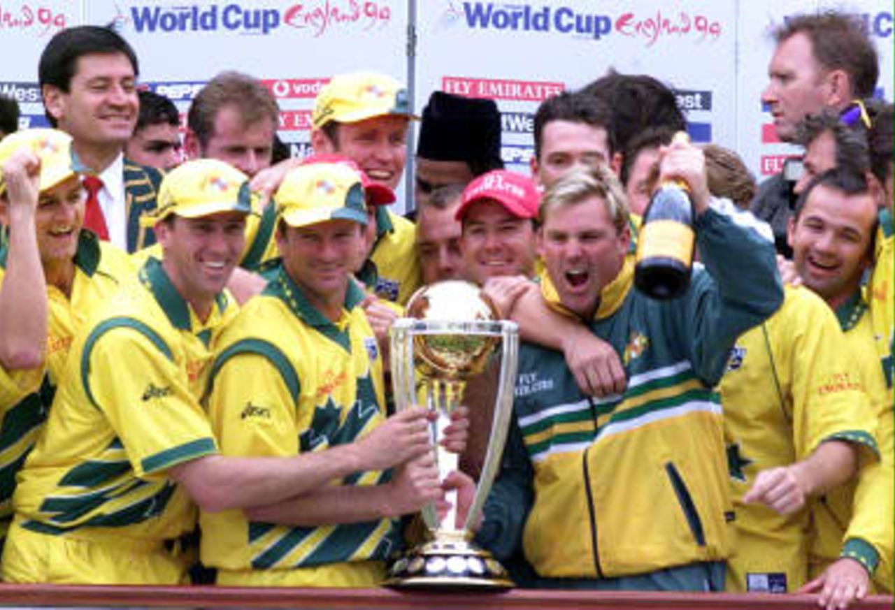 Australia`s cricket team celebrate with the Cricket World Cup from the balcony of Lords after defeating Pakistan by eight wickets in the final at Lords in London, 20 June 1999.