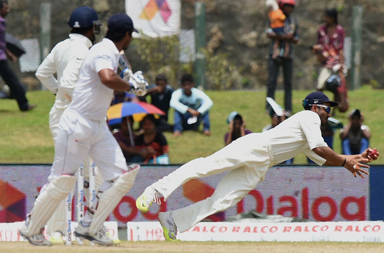Ajinkya Rahane flies to his left to hold on to a catch to dismiss Kumar Sangakkara, Sri Lanka v India, 1st Test, Galle, 3rd day, August 14, 2015