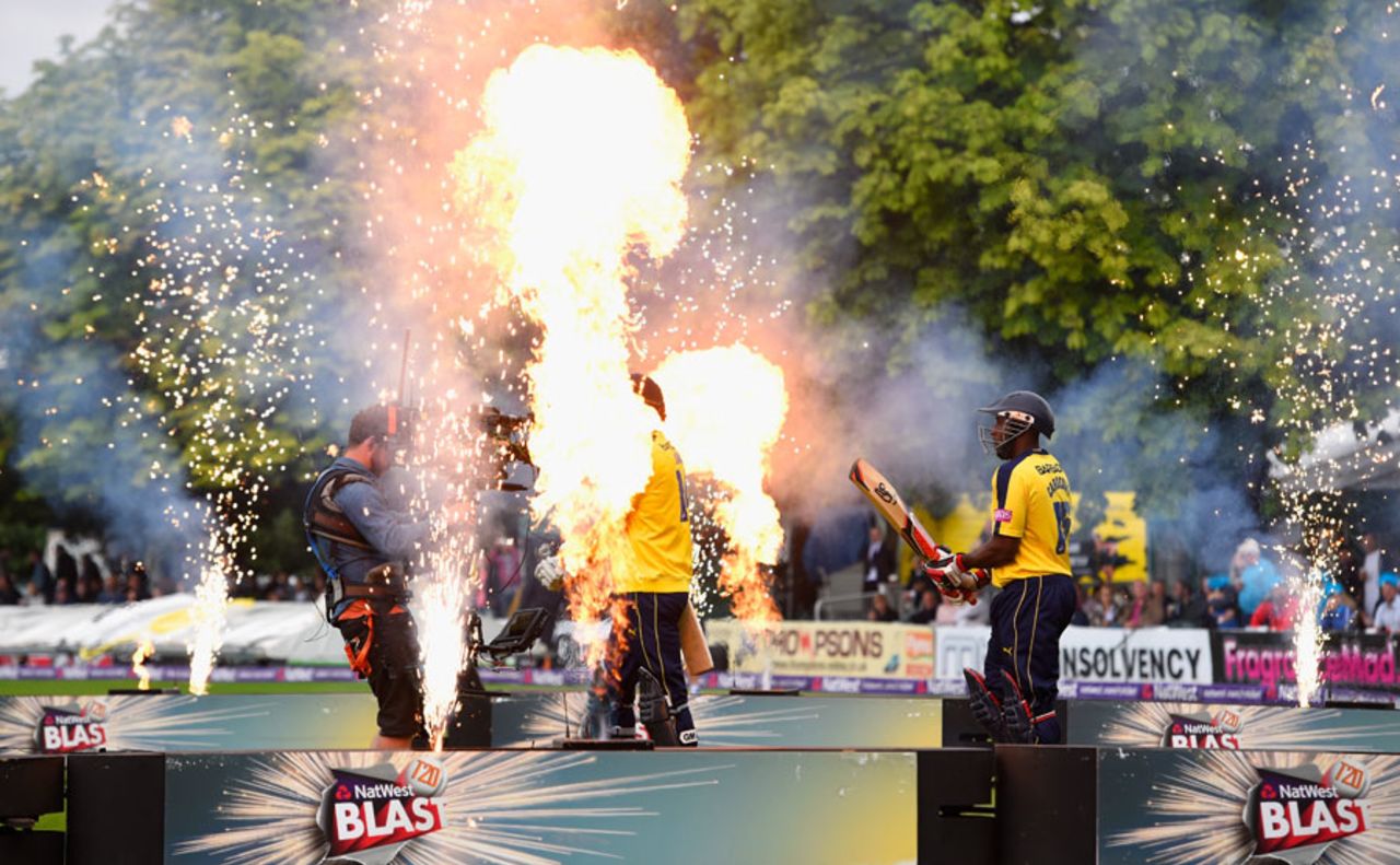 Playing with fire: James Vince and Michael Carberry walk out through the flames, Worcestershire v Hampshire, NatWest T20 Blast quarter-final, New Road, August 14, 2015