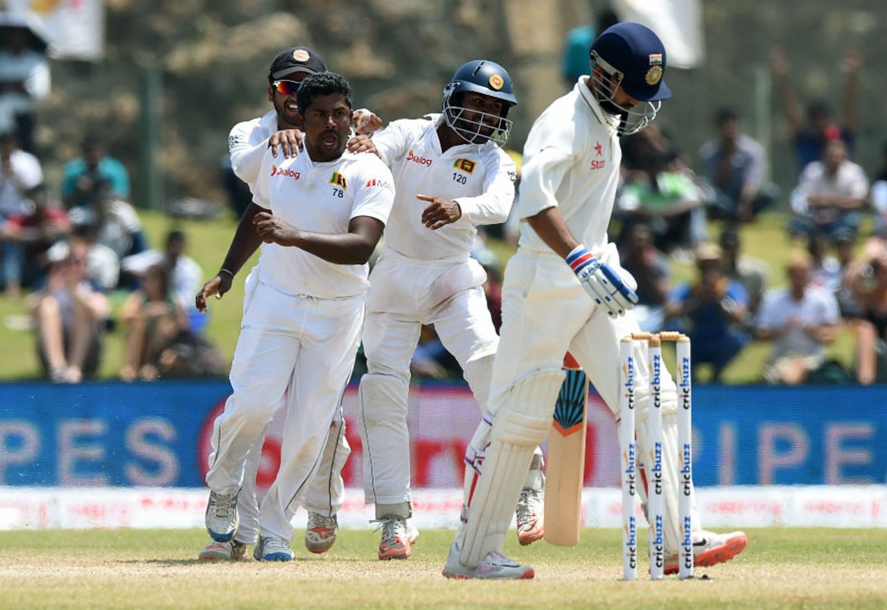 Rangana Herath is all fired up after getting the wicket of Ajinkya Rahane, Sri Lanka v India, 1st Test, Galle, 4th day, August 15, 2015