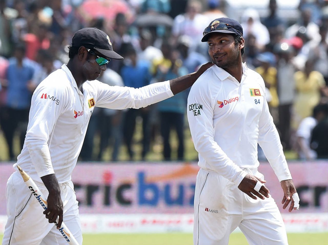 Well done mate: Kumar Sangakkara gets a pat on the back from Angelo Mathews, Sri Lanka v India, 1st Test, Galle, 4th day, August 15, 2015