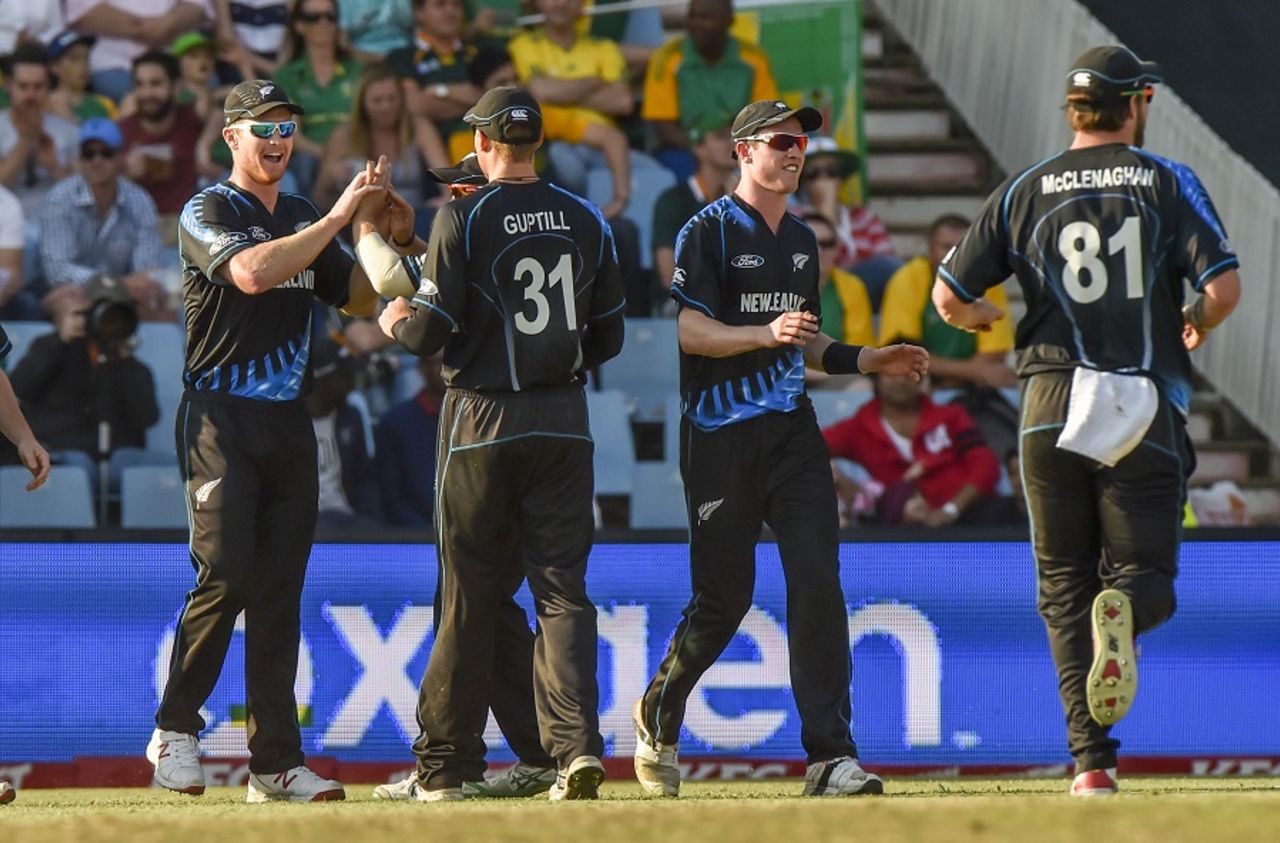 James Neesham is mobbed by his team-mates,  South Africa v New Zealand, 2nd T20I, Centurion, August 16, 2015