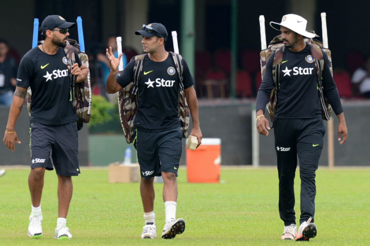 All guns loaded: M Vijay, Stuart Binny and KL Rahul arrive at a training session, Colombo, August 18, 2015 