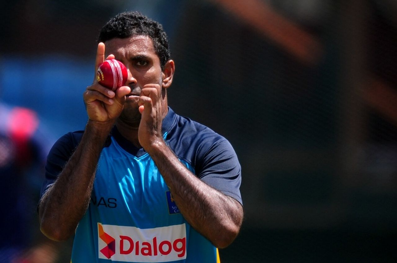 Target locked: Dhammika Prasad runs in to bowl at training, Colombo, August 19, 2015