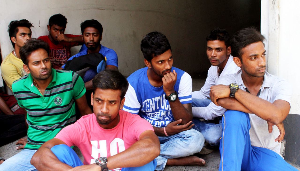 Ankit Keshri's team-mates wait outside the hospital after hearing the news of his death, Kolkata, April 21, 2015