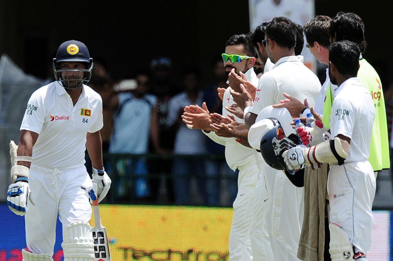 Kumar Sangakkara is given a guard of honour by the Indian team as he walks out to bat in his final Test, Sri Lanka v India, 2nd Test, Colombo, 2nd day, August 21, 2015