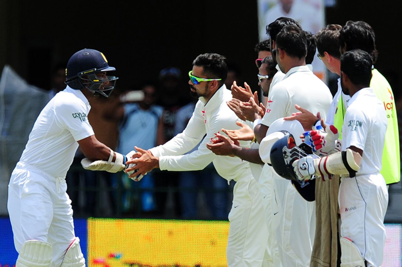 Virat Kohli congratulates Kumar Sangakkara as he walks out to bat, Sri Lanka v India, 2nd Test, Colombo, 2nd day, August 21, 2015