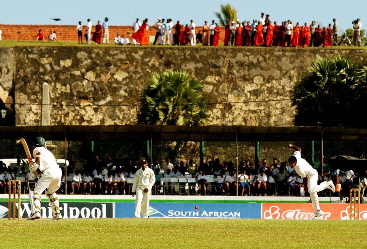 Buddhist monks and other spectators watch the proceedings from Galle Fort, Sri Lanka v South Africa, 1st Test, Galle, 3rd day, August 6, 2004