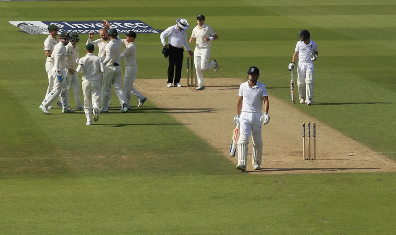 Australia celebrate as Alastair Cook is bowled by Nathan Lyon on the stroke of tea,  England v Australia, 5th Investec Ashes Test, The Oval, 2nd day, August 21, 2015