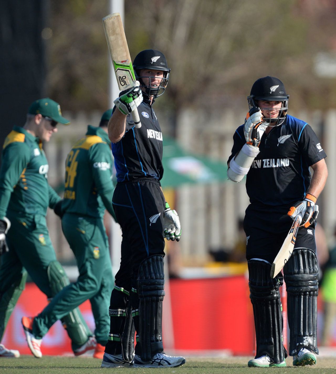 Martin Guptill raises his bat after reaching his half-century, South Africa v New Zealand, 2nd ODI, Potchefstroom 