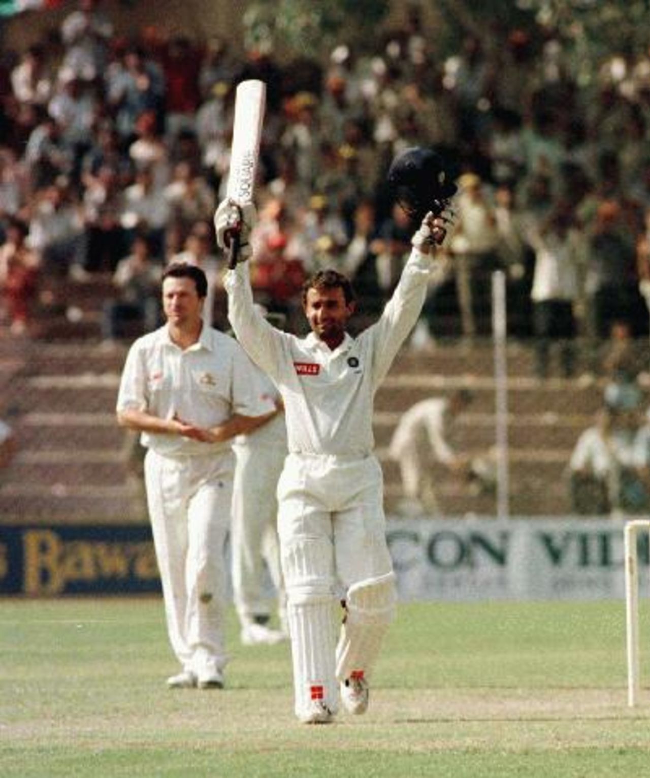 Nayan Mongia celebrates his maiden Test century on day 2 of the 1996/97 India vs Australia test at New Delhi