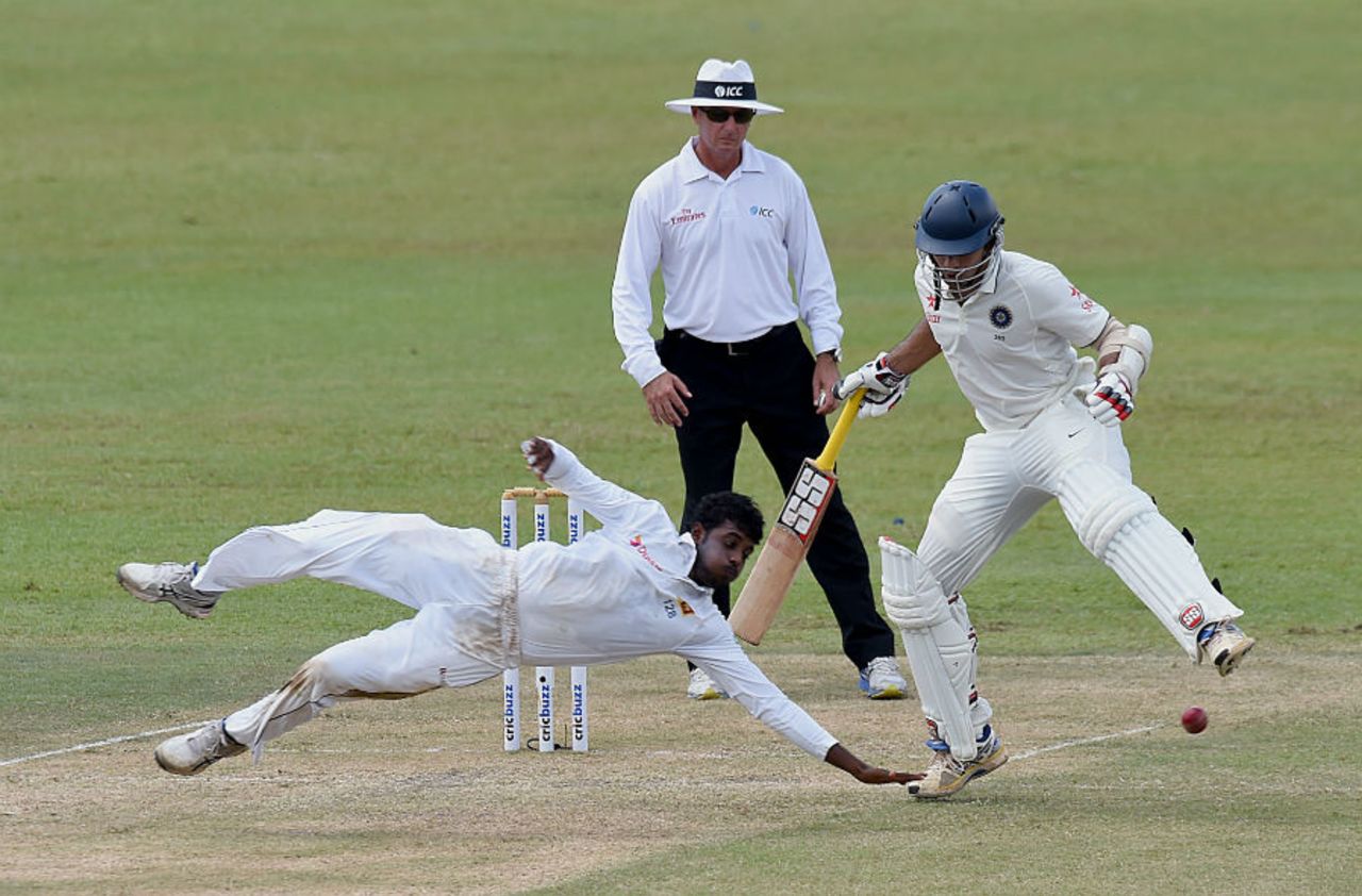 Tharindu Kaushal attempts to field off his own bowling, Sri Lanka v India, 3rd Test, SSC, Colombo, 2nd day, August 29, 2015