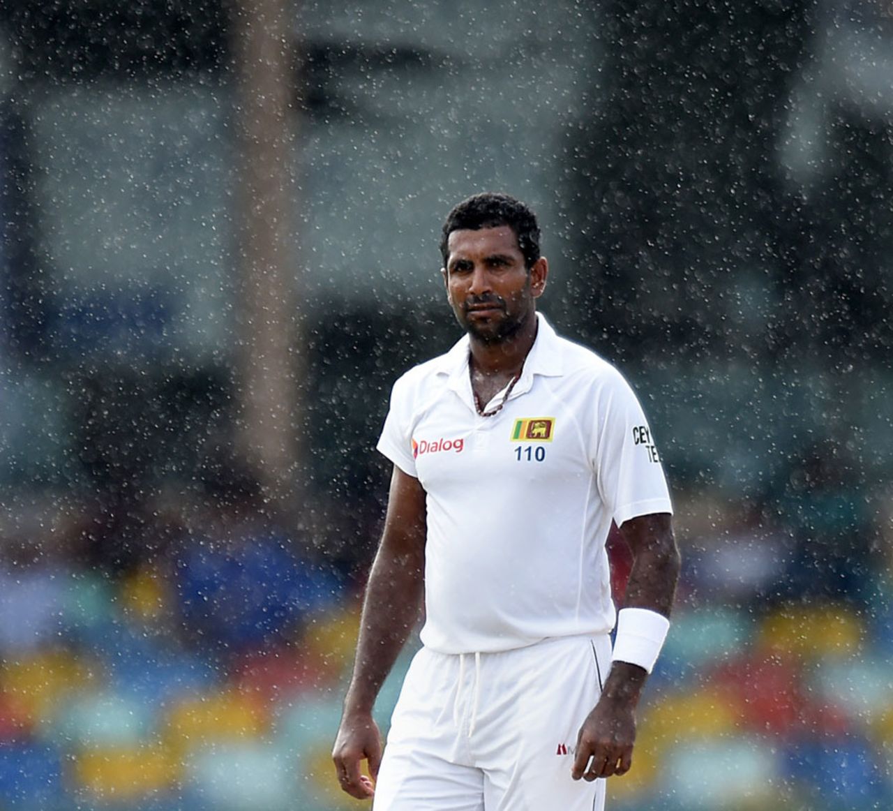 Dhammika Prasad looks on amidst the rain, Sri Lanka v India, 3rd Test, SSC, Colombo, 2nd day, August 29, 2015