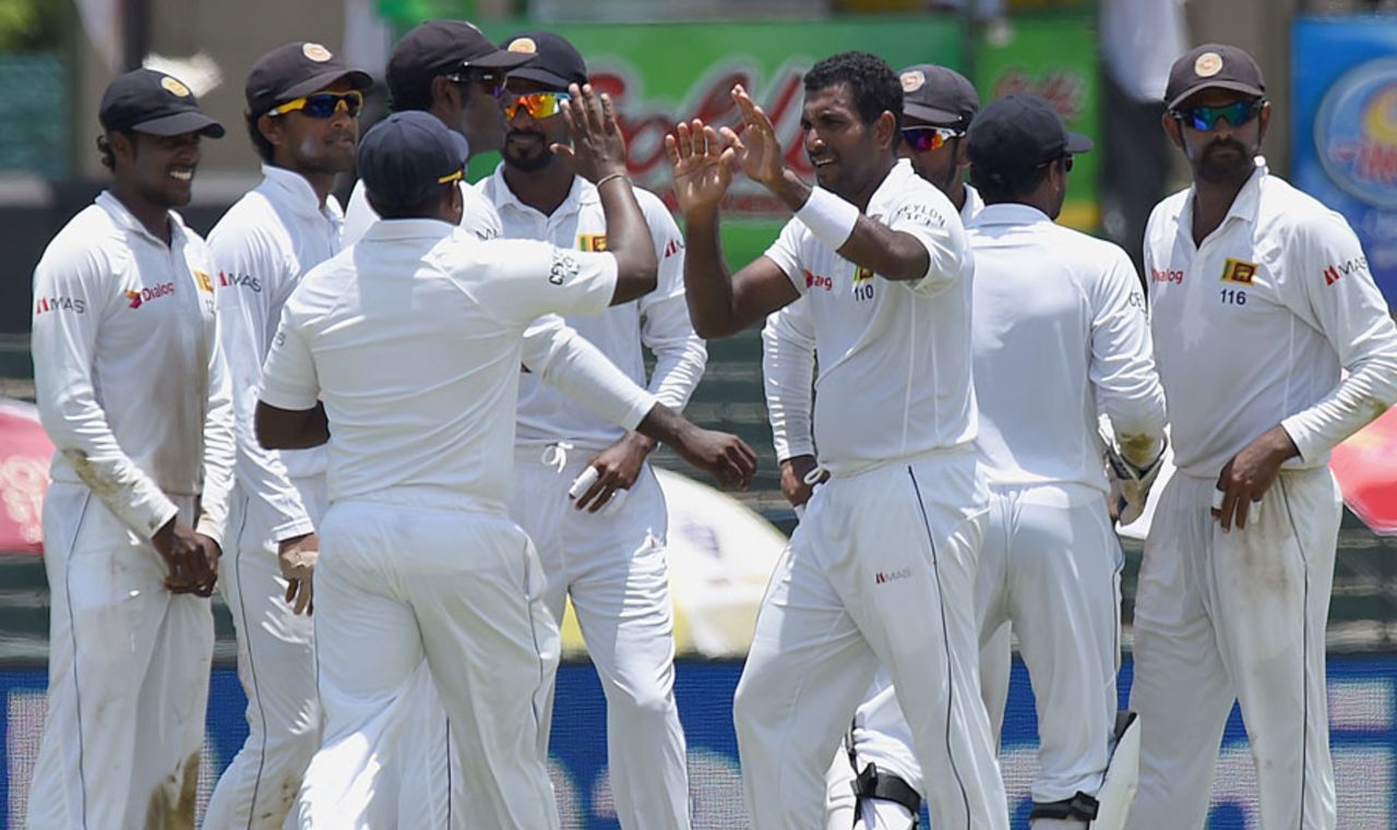 Dhammika Prasad celebrates the wicket of Rohit Sharma, Sri Lanka v India, 3rd Test, SSC, Colombo, 2nd day, August 29, 2015