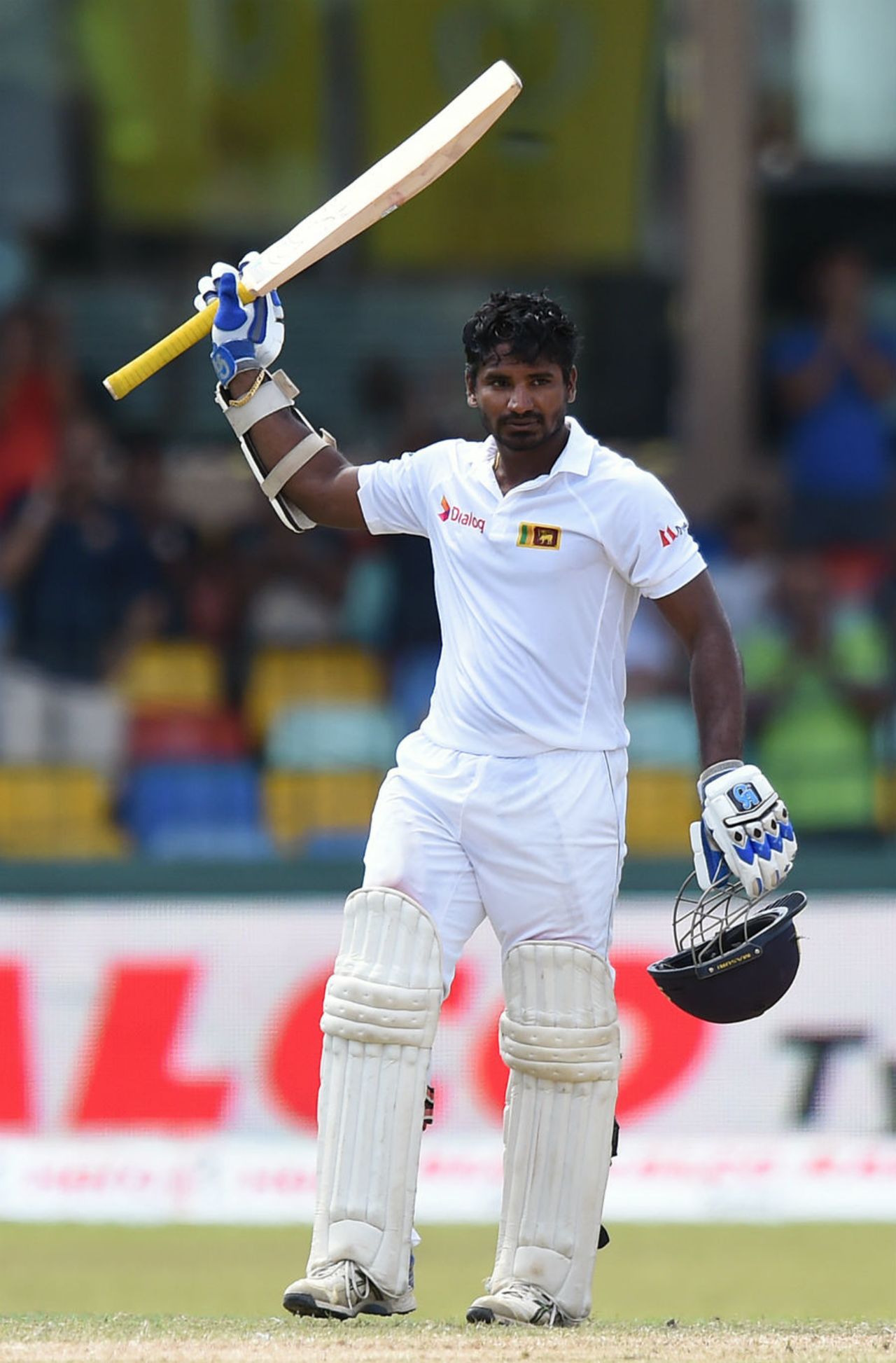 Kusal Perera raises the bat after his maiden Test fifty, Sri Lanka v India, 3rd Test, SSC, Colombo, 3rd day, August 30, 2015