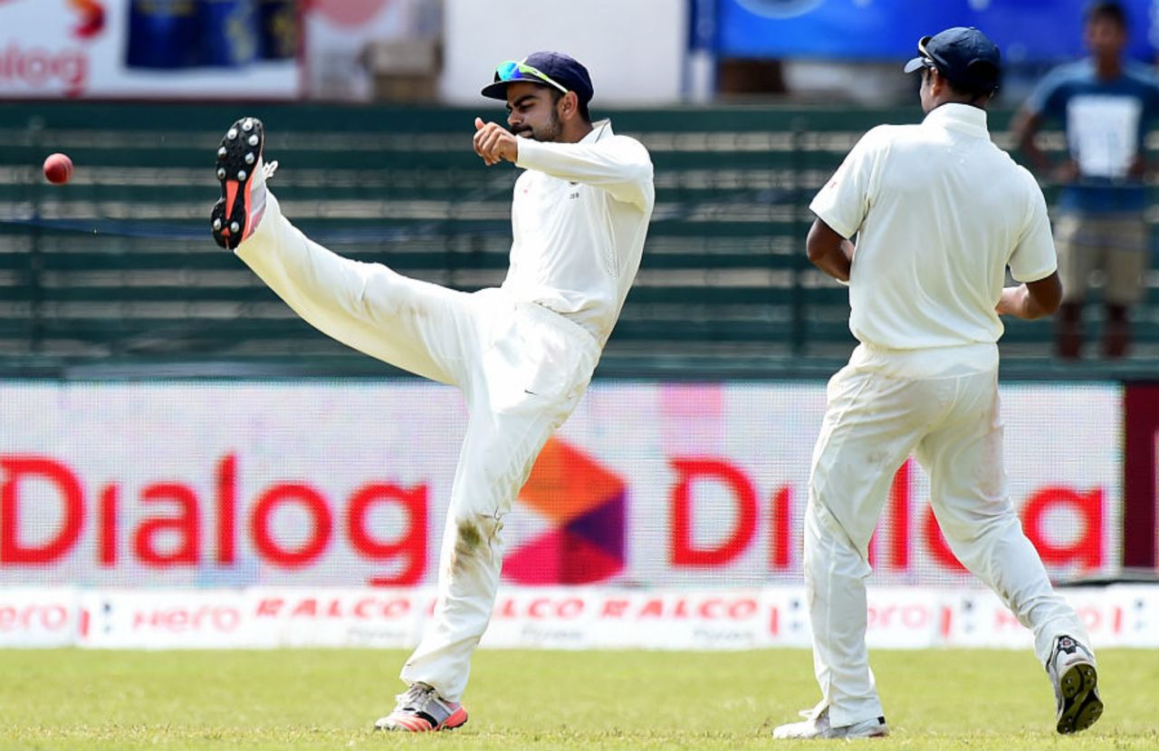 Virat Kohli celebrates after taking a catch to dismiss Kusal Perera, Sri Lanka v India, 3rd Test, SSC, Colombo, 3rd day, August 30, 2015