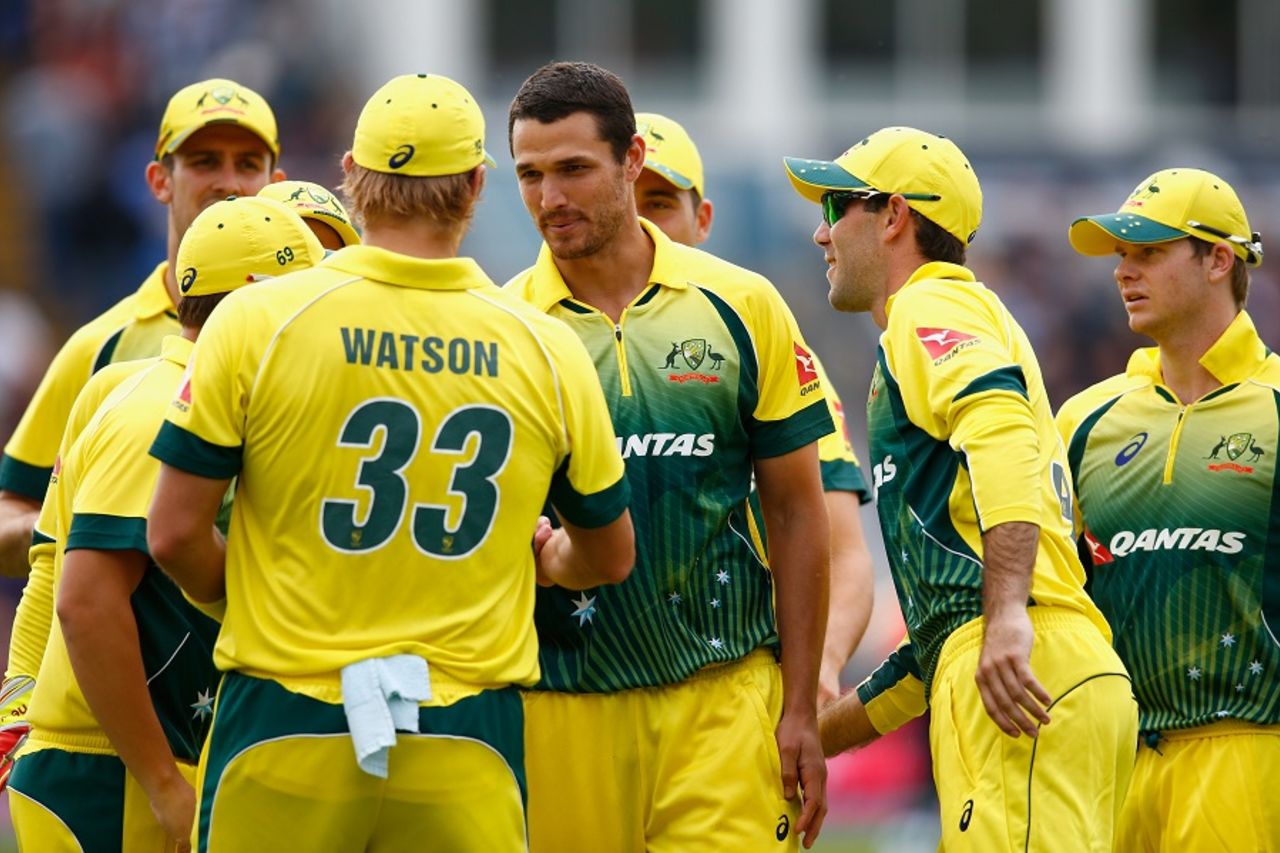 Nathan Coulter-Nile is congratulated on the wicket of Eoin Morgan,  England v Australia, only T20, Cardiff, August 31, 2015