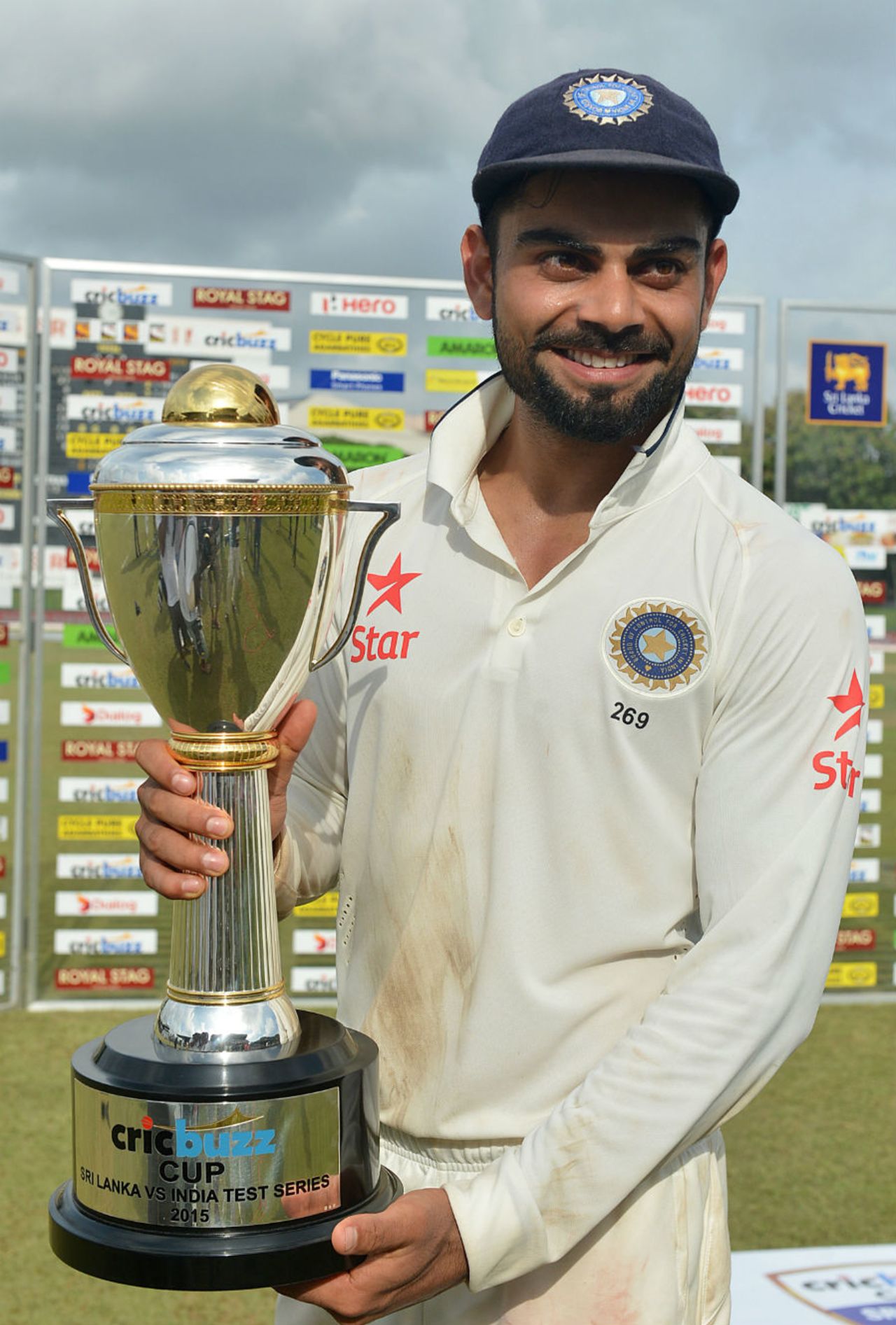 A jubilant Virat Kohli poses with the trophy, Sri Lanka v India, 3rd Test, SSC, Colombo, 5th day, September 1, 2015