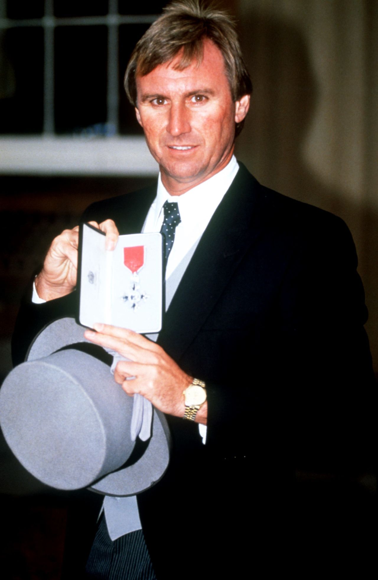 John Lever poses with his MBE, London, November 16, 1990