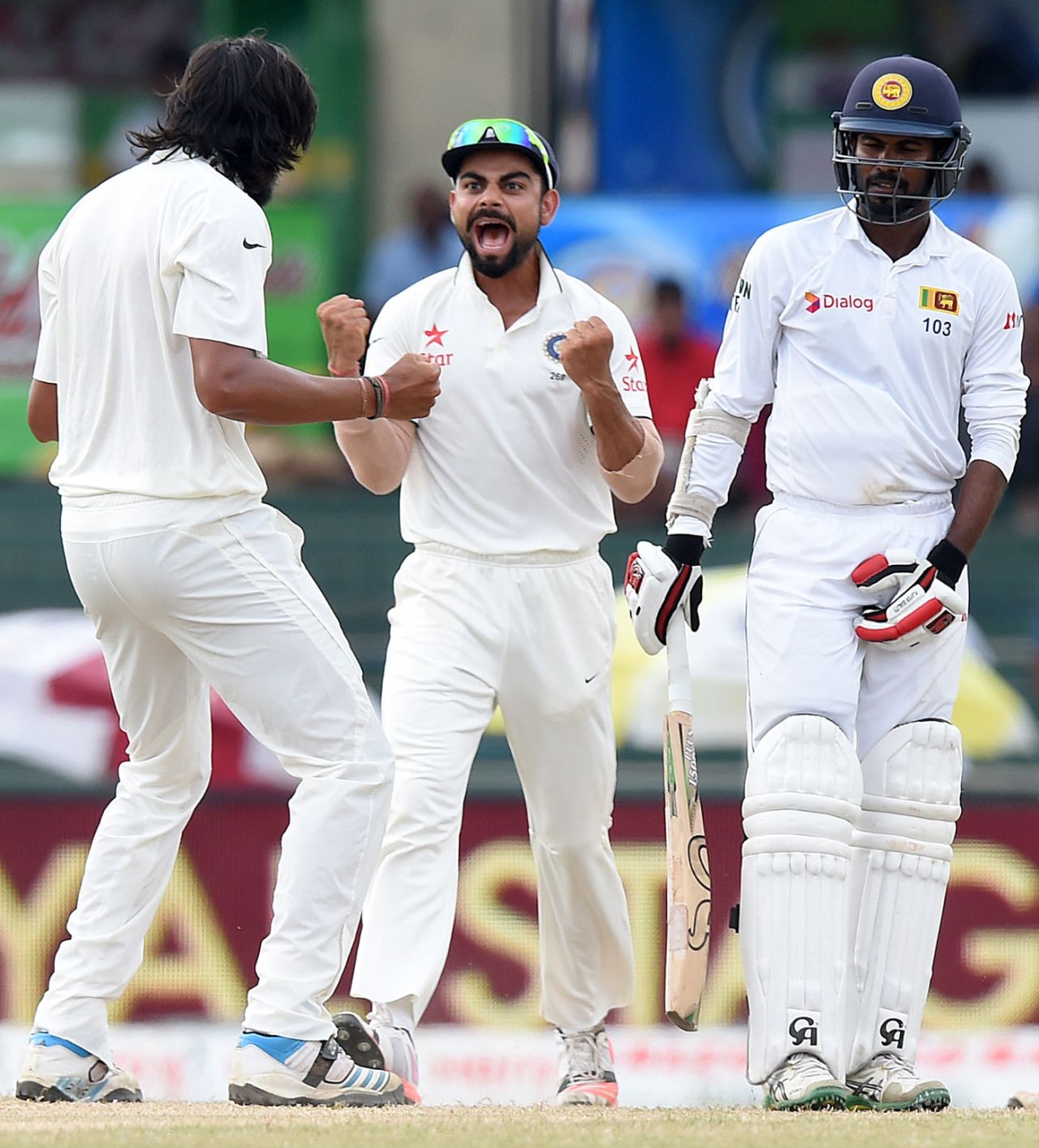 Ishant Sharma and and Virat Kohli celebrate Upul Tharanga's wicket,  Sri Lanka v India, 3rd Test, SSC, Colombo, 4th day, August 31, 2015