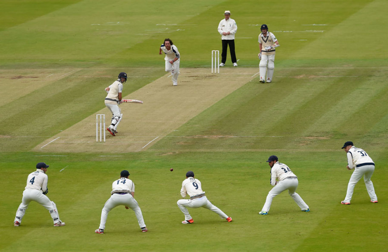 Adam Lyth stoops to take a catch off Ryan Sidebottom's bowling, Middlesex v Yorkshire, County Championship, Division One, Lord's, 1st day, September 9, 2015