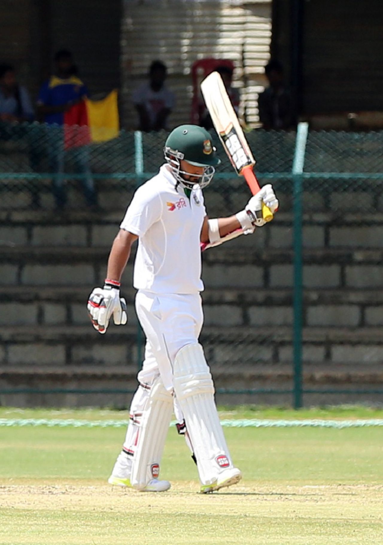 Liton Das raises his bat after reaching a fifty, Karnataka v Bangladesh A, Mysore, 1st day, September 22, 2015