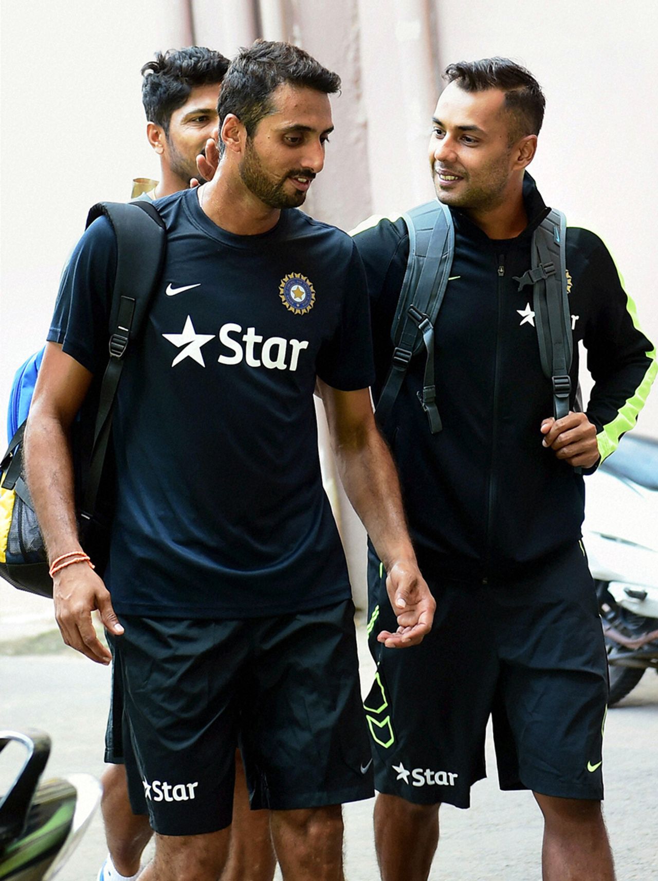 S Aravind and Stuart Binny have a chat before India's camp at the National Cricket Academy, Bangalore, September 22, 2015