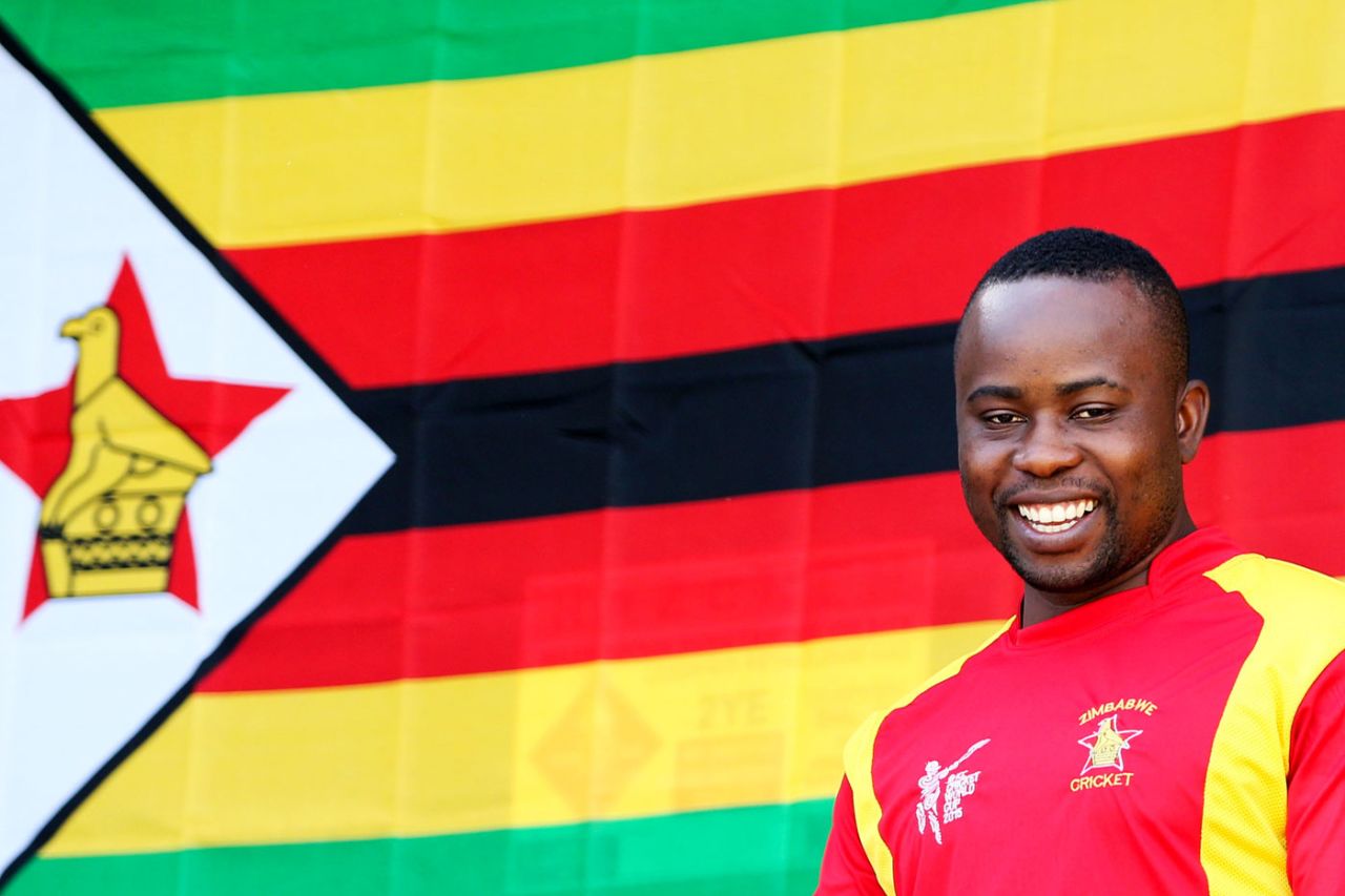 Prosper Utseya looks on with the Zimbabwe flag in the background, United Arab Emirates v Zimbabwe, World Cup 2015, Group B, Nelson, February 19, 2015