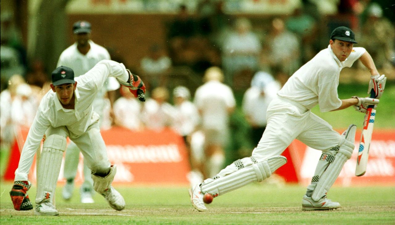 Wicketkeeper Nic Pothas watches the ball run past Mike Atherton's bat, South African Students XI v England XI, Pietermaritzburg, 2nd day, December 21, 1995