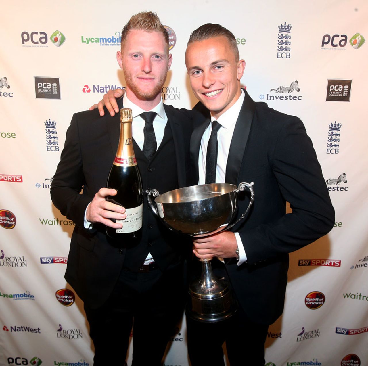 Surrey's Tom Curran after receiving the John Arlott Cup for the PCA Young Player of the Year from Ben Stokes, London, September 29, 2015