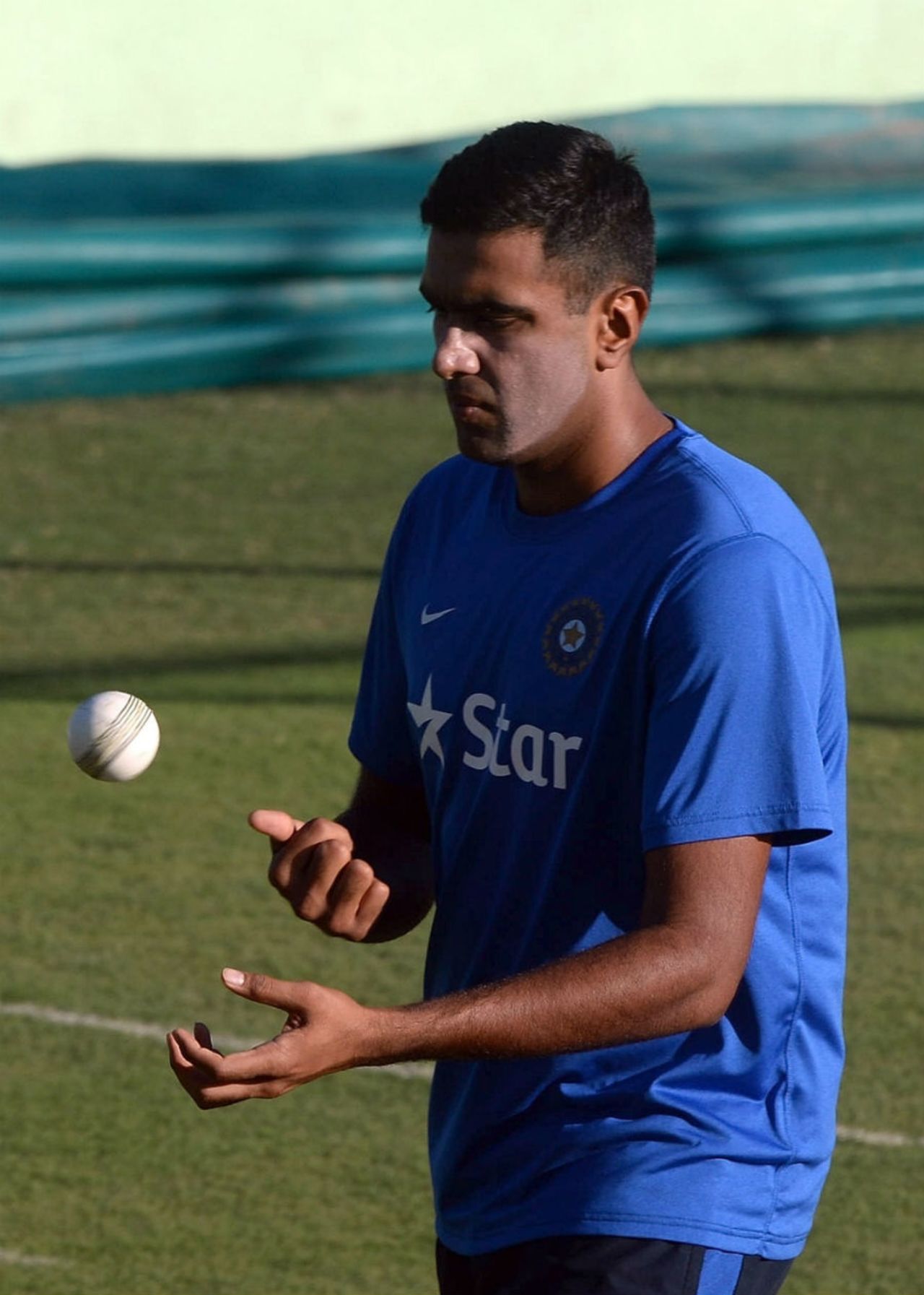 R Ashwin tosses the ball during a training session, Dharamsala, October 1, 2015