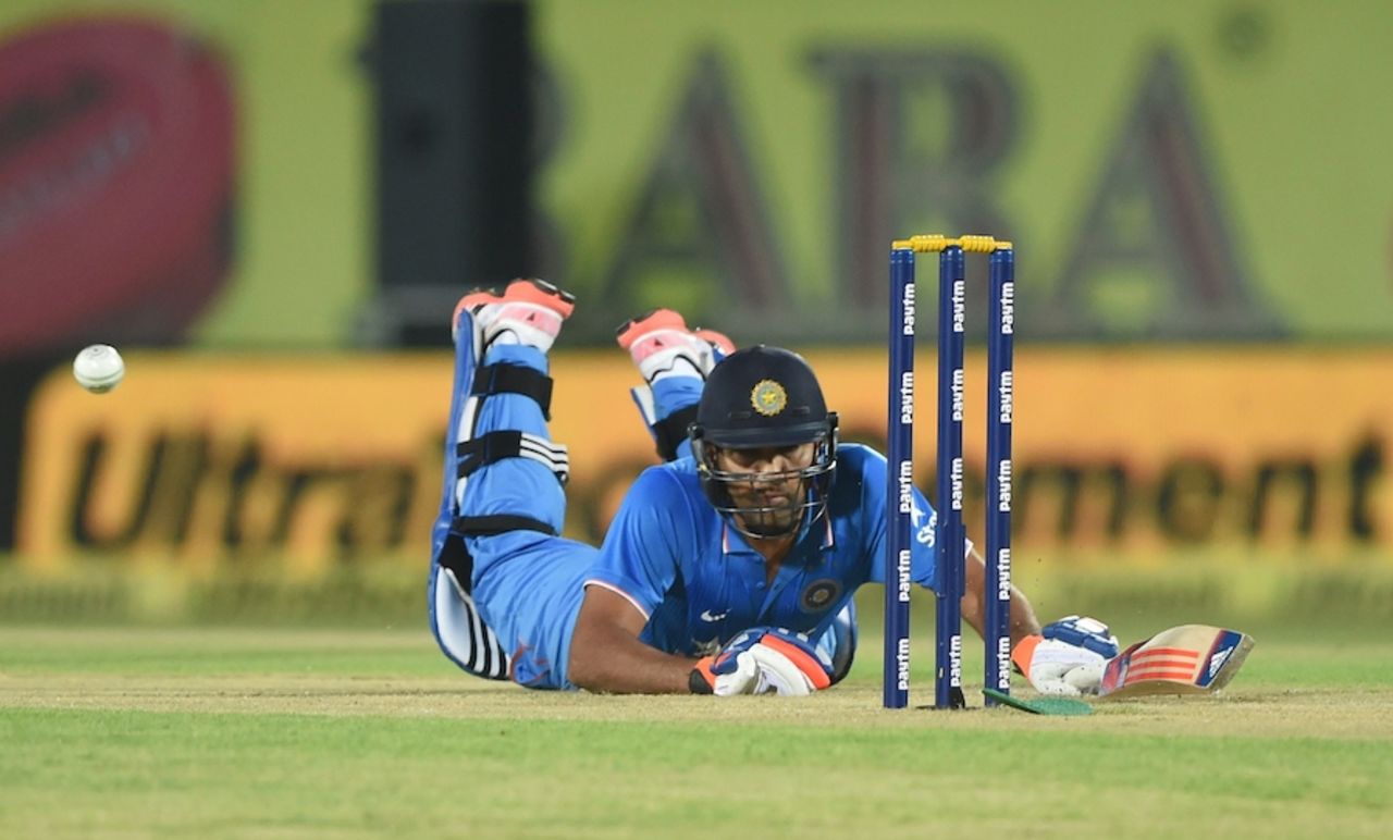 Rohit Sharma had to dive early on after a small mix-up, India v South Africa, 1st T20, Dharamsala, October 2, 2015