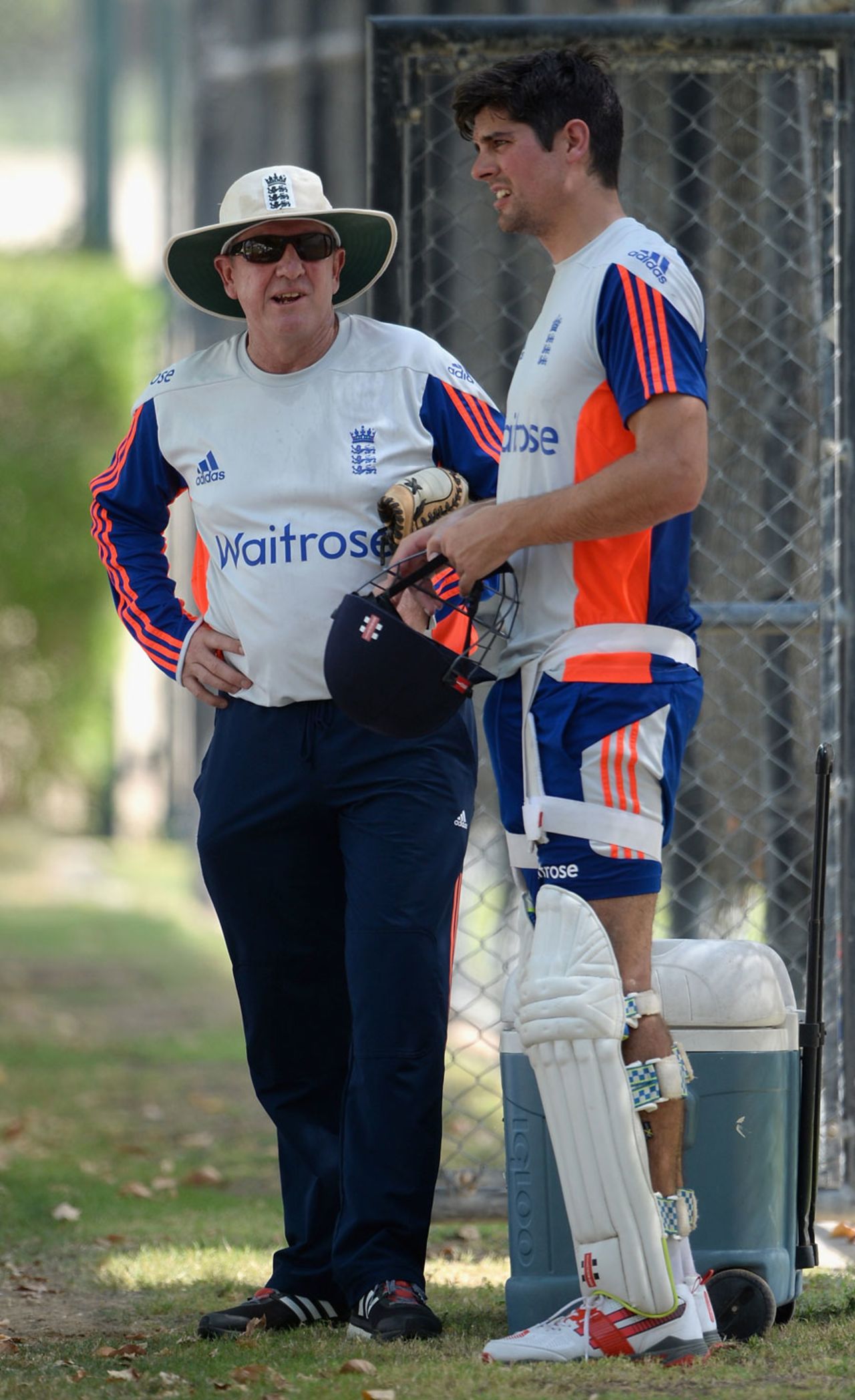 Trevor Bayliss and Alastair Cook have a chat in the shade, Dubai, October 3, 2015