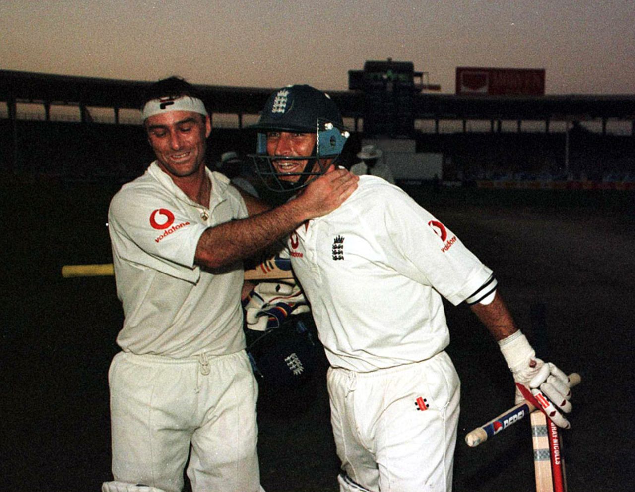 Nasser Hussain and Graham Thorpe celebrate victory in the dark, Pakistan v England, 3rd Test, Karachi, December 11, 2000