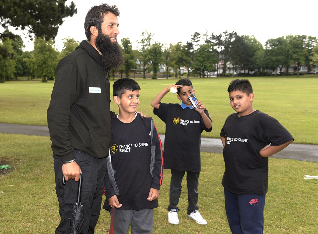 Moeen Ali with young boys of Chance to Shine Street at Sparkhill Park, Birmingham, September 2015
