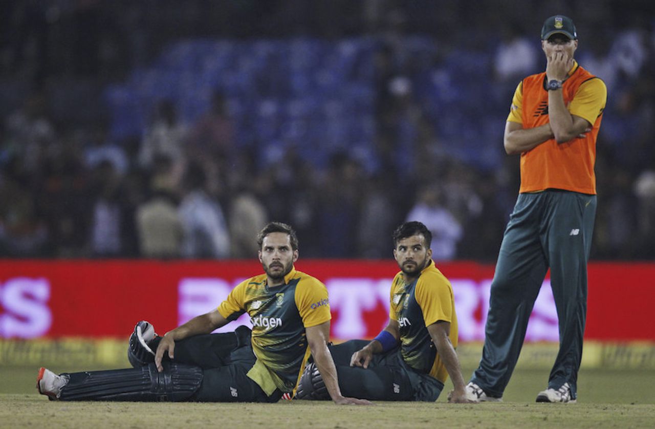 Farhaan Behardien and JP Duminy look on during a crowd interruption, India v South Africa, 2nd T20I, Cuttack, October 5, 2015