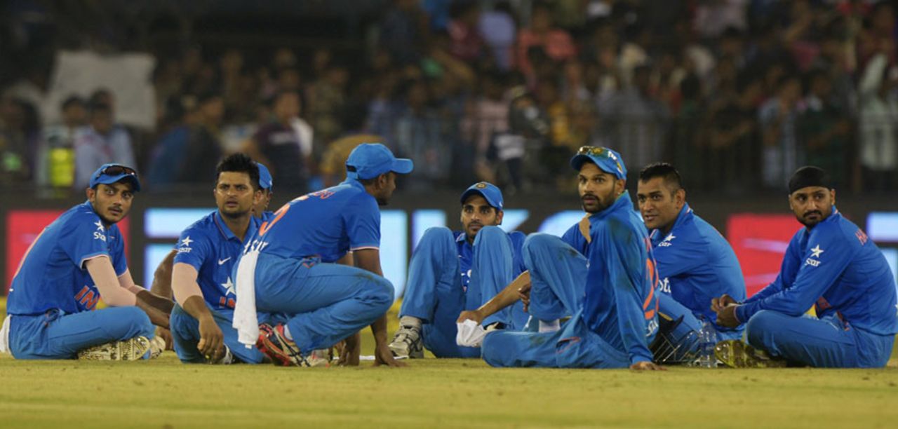 India players wait in the middle as crowd trouble held up play, India v South Africa, 2nd T20I, Cuttack, October 5, 2015