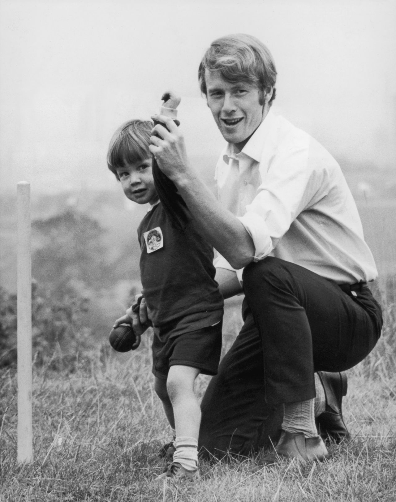 Peter Lever plays with his son Stuart, October 1970