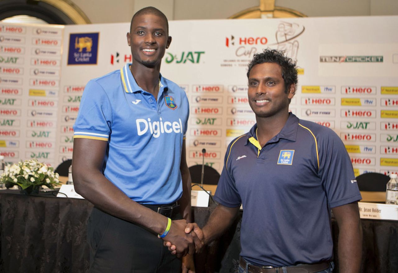 Jason Holder and Angelo Mathews pose ahead of the Test series, Colombo, October 6, 2015