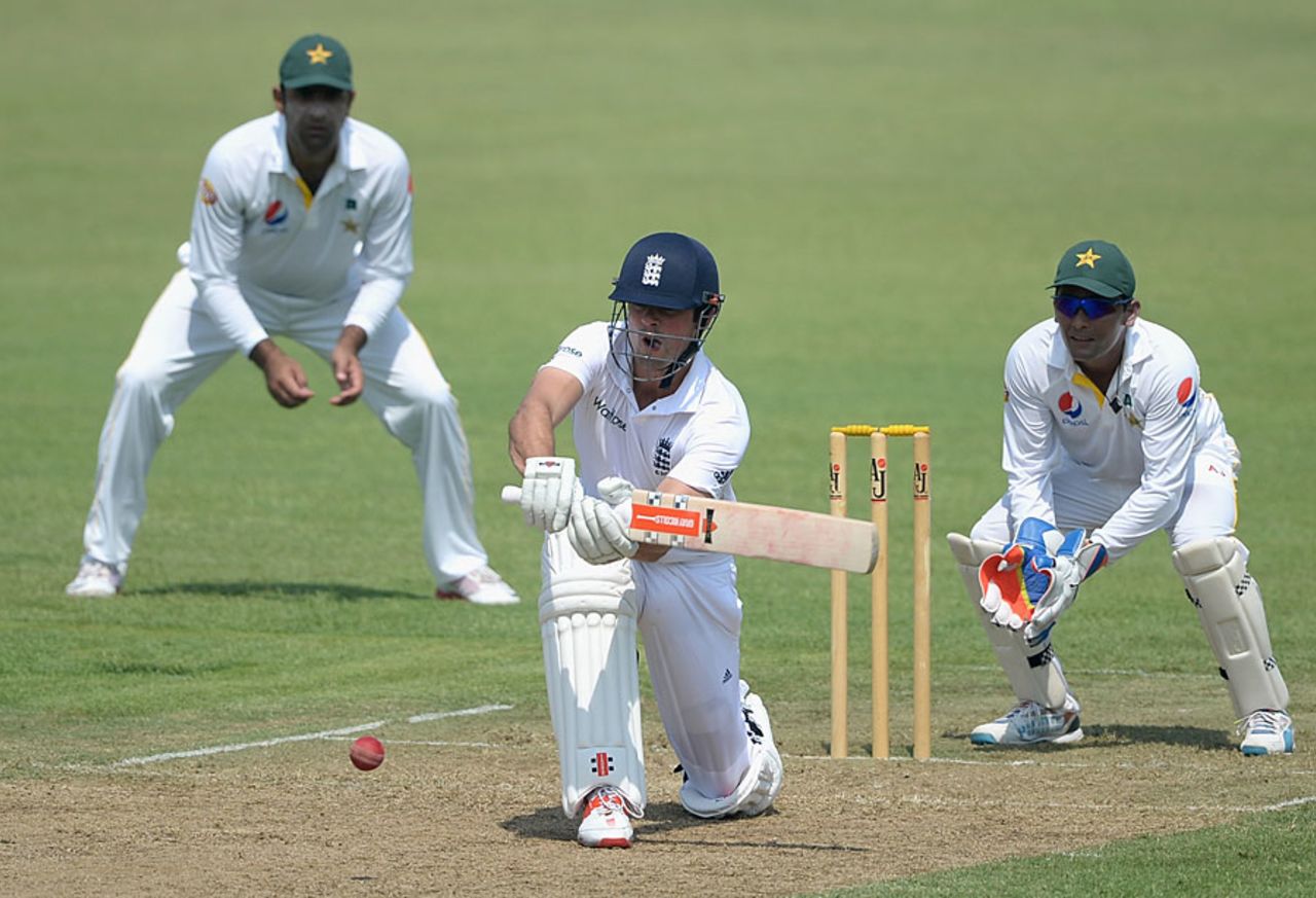 Alastair Cook sweeps during his half-century, Pakistan A v England XI, Sharjah, 1st day, October 5, 2015