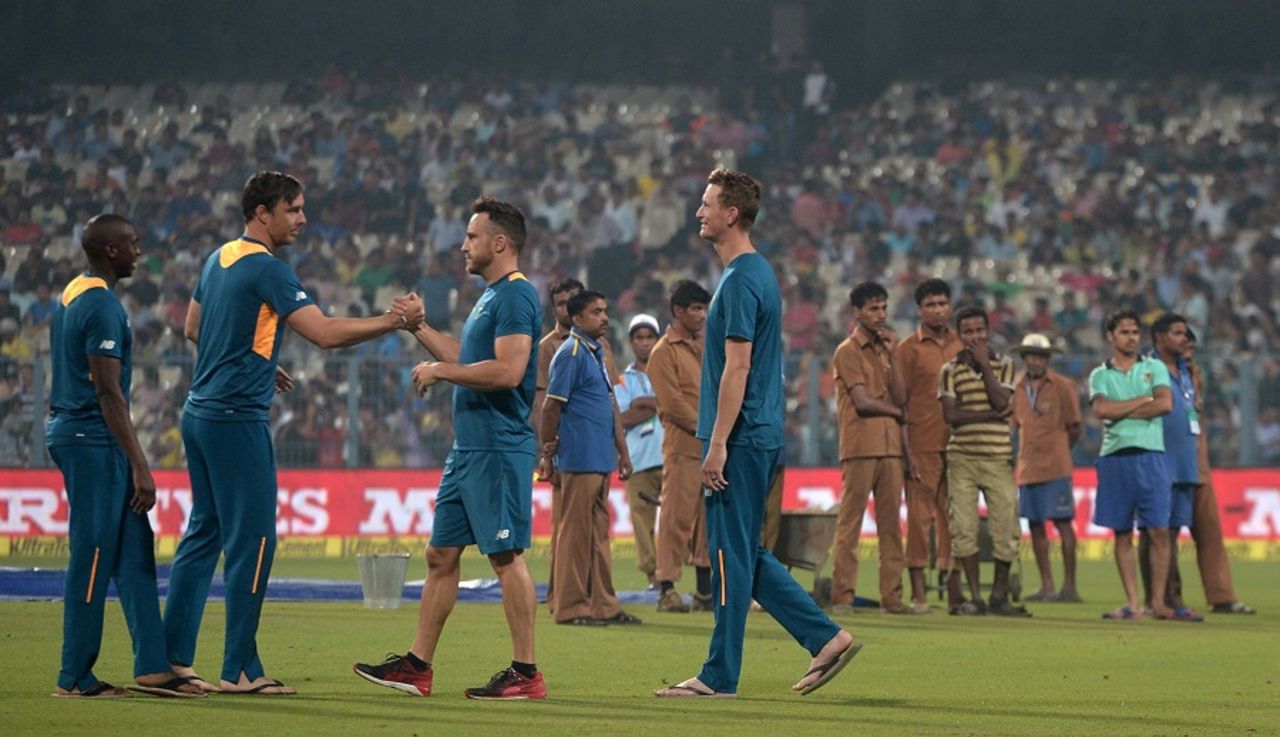 Faf du Plessis congratulates his team-mates on winning the series 2-0, India v South Africa, 3rd T20I, Kolkata, October 8, 2015