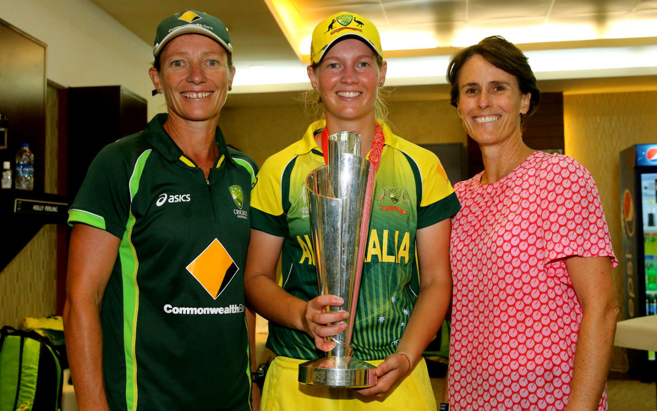Coach Cathryn Fitzpatrick, captain Meg Lanning and ICC women's committee member Belinda Clark pose with the World T20 trophy, Australia v England, Women's World T20, final, April 6, 2014