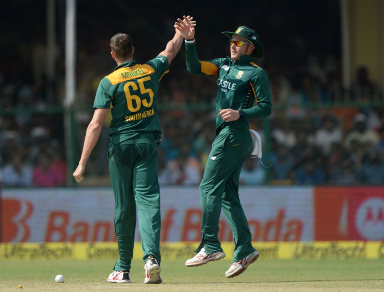 Morne Morkel and David Miller celebrate the wicket of Shikhar Dhawan, India v South Africa, 1st ODI, Kanpur, October 11, 2015