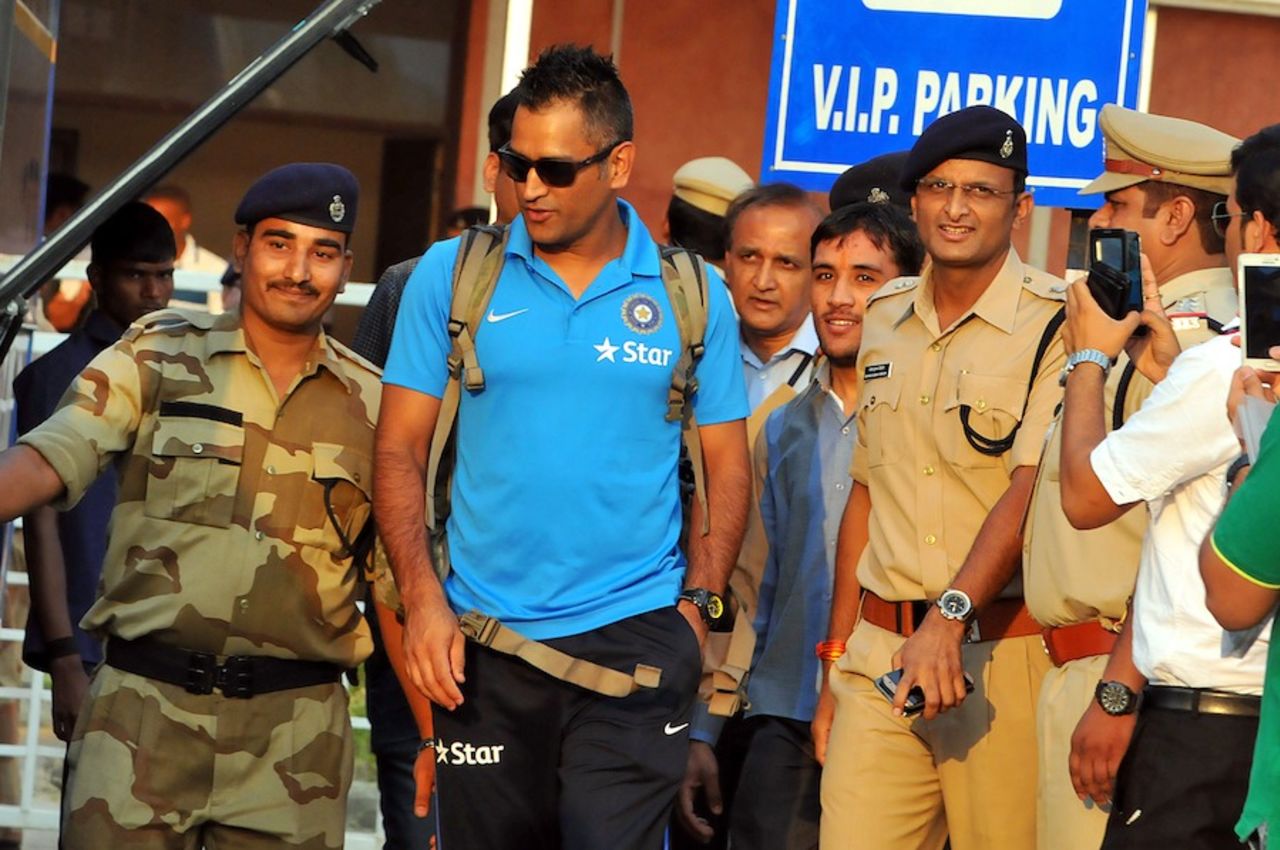 MS Dhoni flanked by policemen in Indore, October 12, 2015