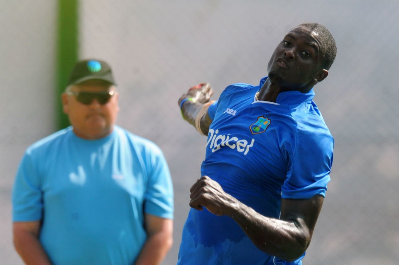 Jason Holder bowls under the bright sun at a practice session, Galle, October 13, 2015