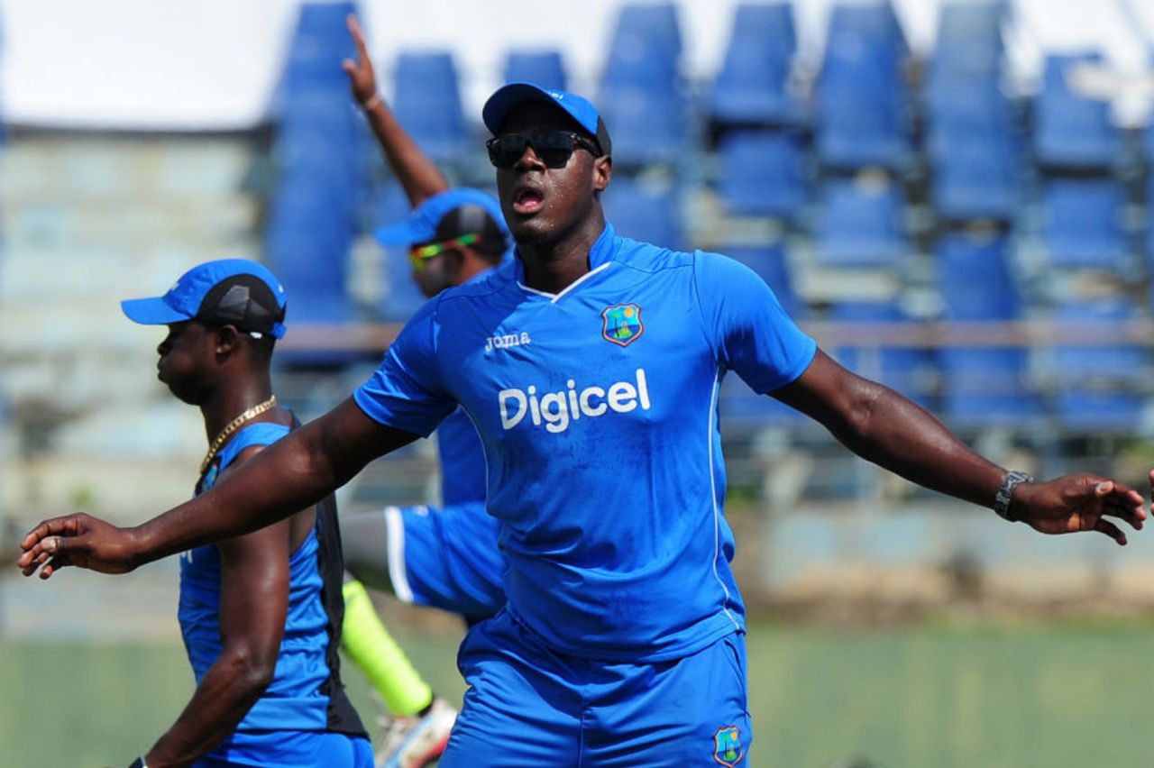 Carlos Brathwaite stretches during a training session, Galle, October 13, 2015